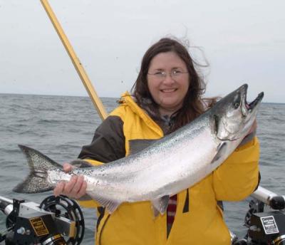 Charter Fishing is for everyone! This woman catches 15lb Chinook King Salmon on June 4th 2009. Aboard the "Nicole Lynn" 40ft Viking in The fleet of Albatross Fishing Charters.