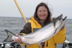 Charter Fishing is for everyone! This woman catches 15lb Chinook King Salmon on June 4th 2009. Aboard the "Nicole Lynn" 40ft Viking in The fleet of Albatross Fishing Charters.